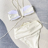Florivelle | Bikini z halterem i kwiatowym detalem