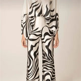 Zarelle | Elegancki Satynowy Komplet z Asymetrycznym Topem i Szerokimi Spodniami