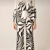 Zarelle | Elegancki Satynowy Komplet z Asymetrycznym Topem i Szerokimi Spodniami