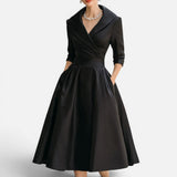 Izabela | Elegancka sukienka midi z dekoltem w serek i rozkloszowanym dołem